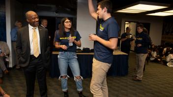 UC Davis Chancellor Gary May chats with ASUCD Vice President Shaniah Branson and ASUCD President Michael Gofman before the start of the Fall Welcome Event at the Pavilion on September 24, 2018.