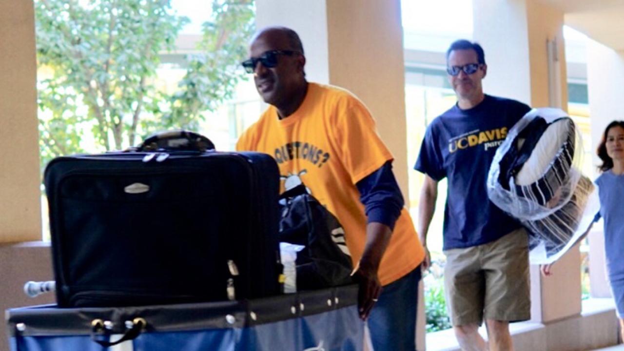 UC Davis Chancellor Gary May helps with Move-in Weekend